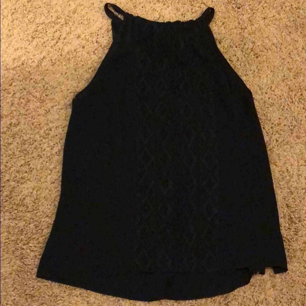 Black sleeveless blouse with lace design in front